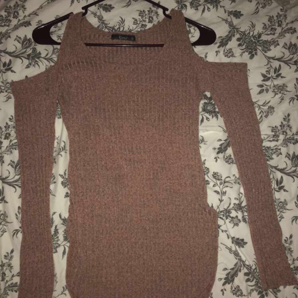 Cold shoulder sweater. In excellent shape.